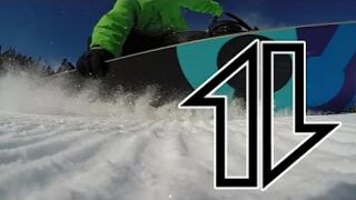 Snowboard carves in slow-mo