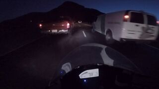 Superbike Rides Hard on Freeway at Night